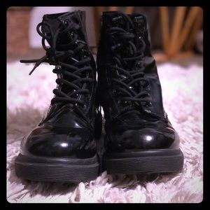 Shiny combat boots